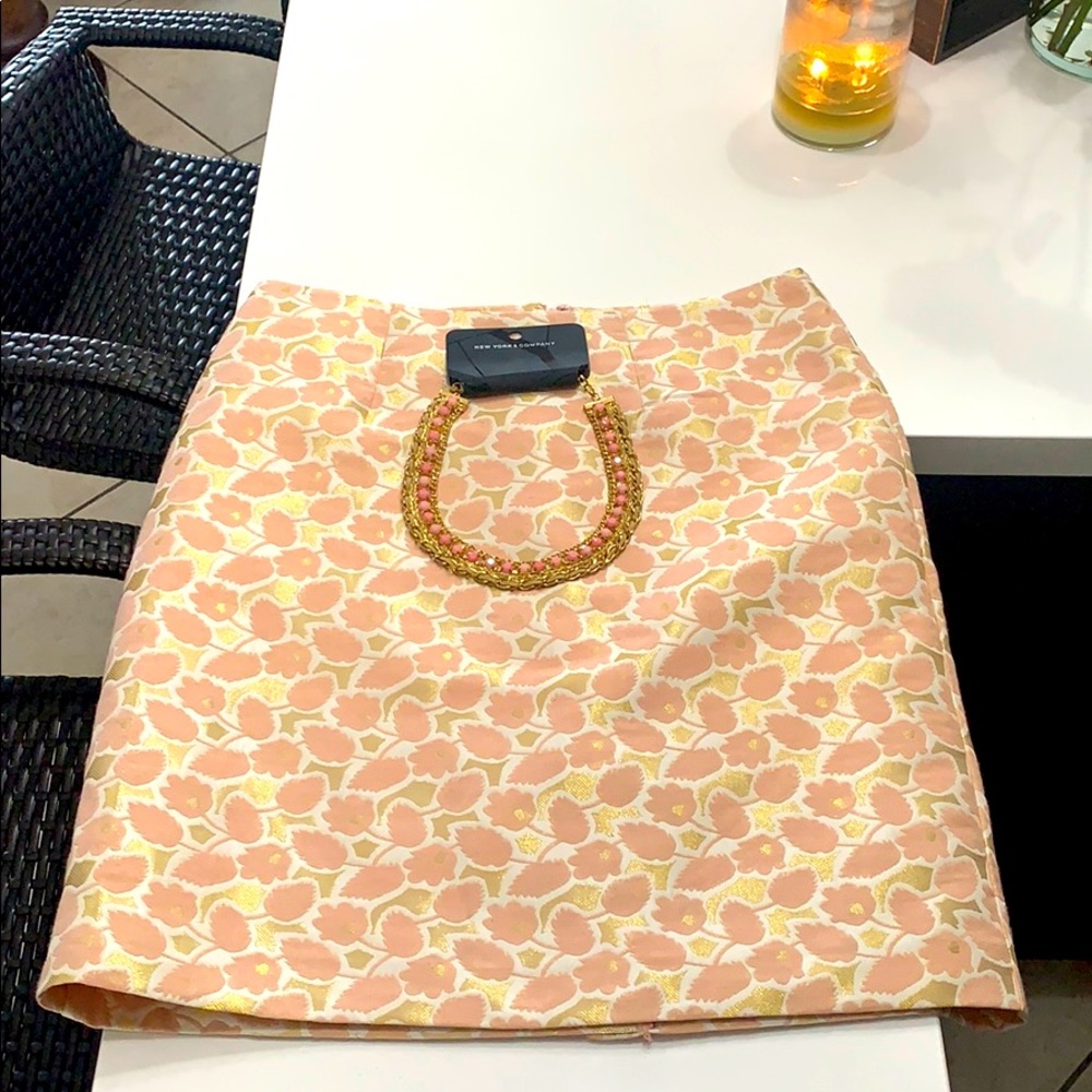 Pastel skirt. Mid thigh.